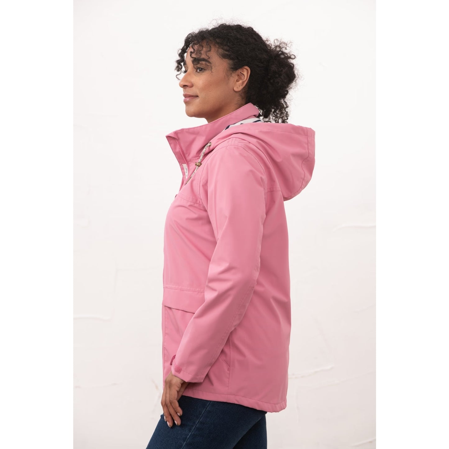 Side view of a womens Beachcomber II waterproof jacket in Pink.