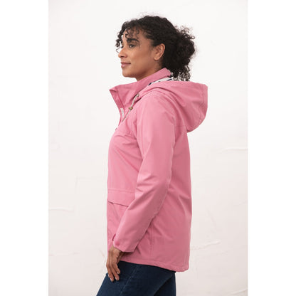 Side view of a womens Beachcomber II waterproof jacket in Pink.