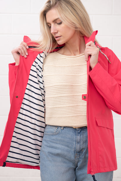 Lighthouse womens waterproof jacket raspberry shown open with striped inner lining on a blonde model