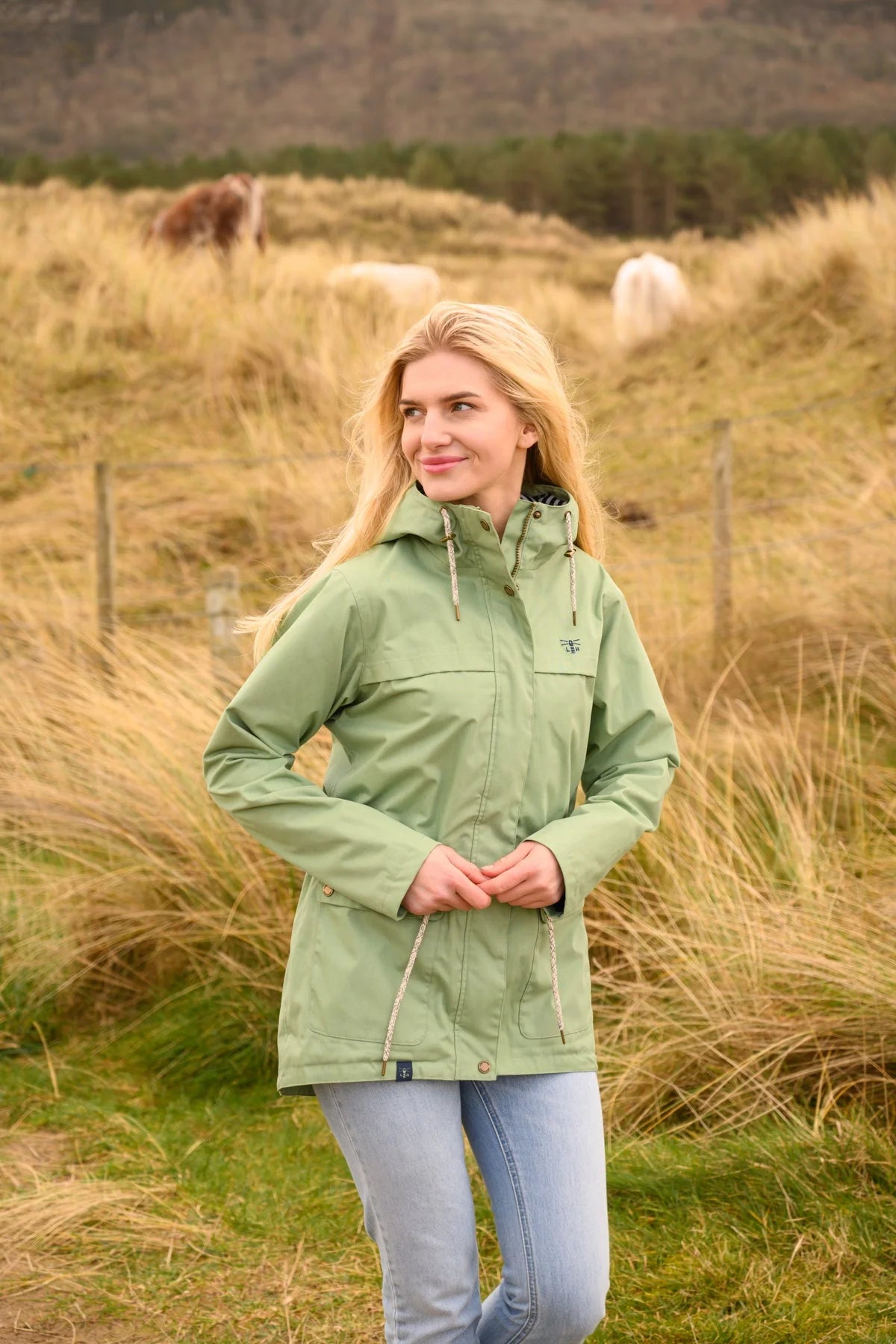 Lighthouse women's Alicia highly waterproof and breathable jacket in Pistachio Green.