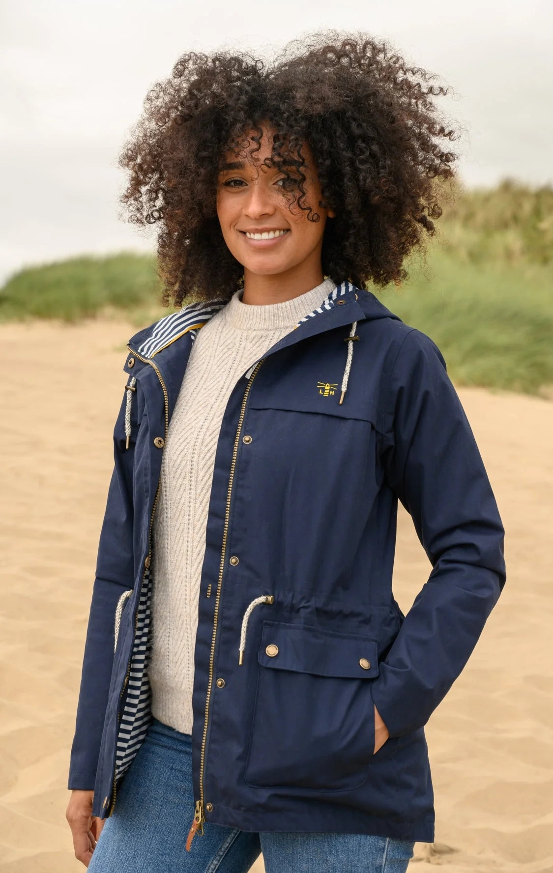 Lighthouse women's navy Alicia waterproof rain jacket.