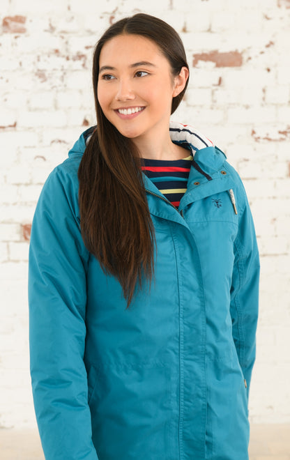 Lighthouse women's Eva Long padded waterproof raincoat in Peacock.