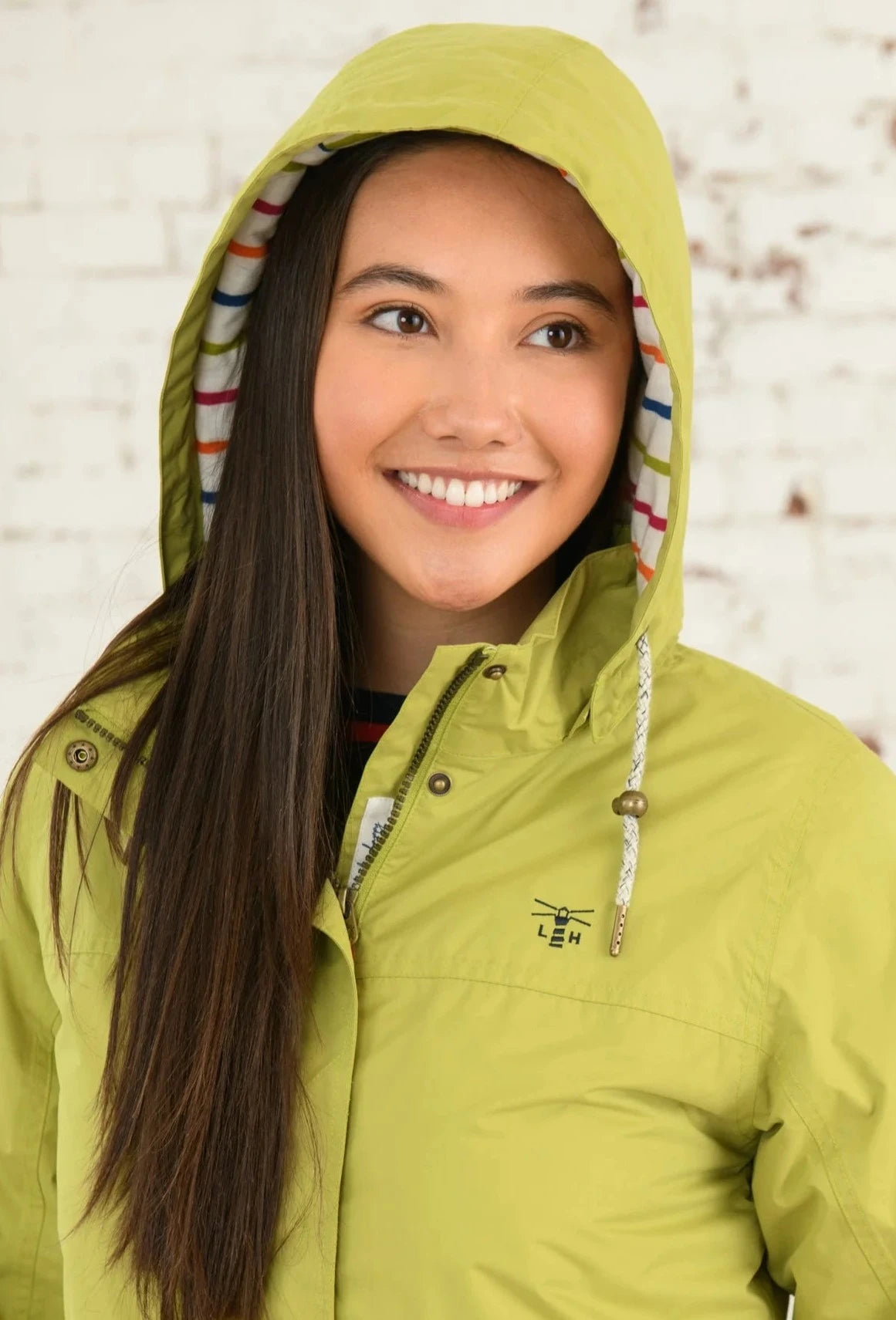 Hooded waterproof padded women's Eva coat from Lighthouse in Apple Green.