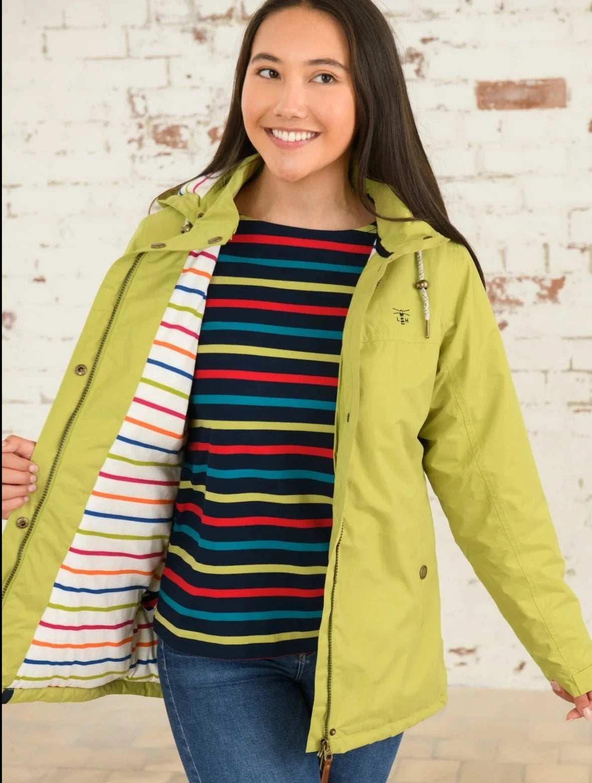 Women's waterproof padded Eva coat from Lighthouse in Apple Green with a multicoloured stripe lining.
