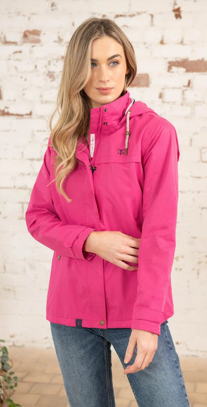 Lighthouse women's bright pink waterproof Beachcomber raincoat.