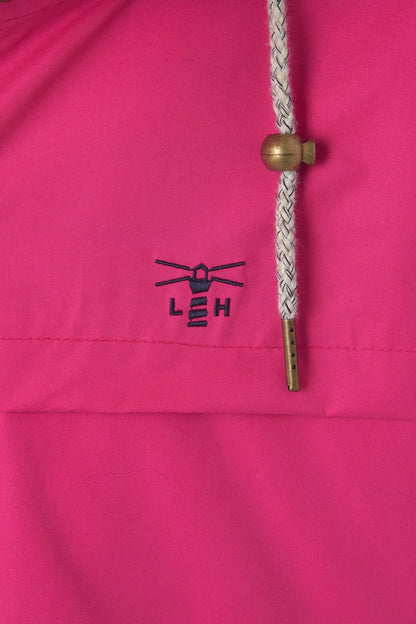Lighthouse women's bright pink waterproof Beachcomber jacket with embroidered logo.