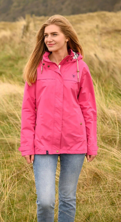 Bright pink women's waterproof Beachcomber raincoat from Lighthouse.