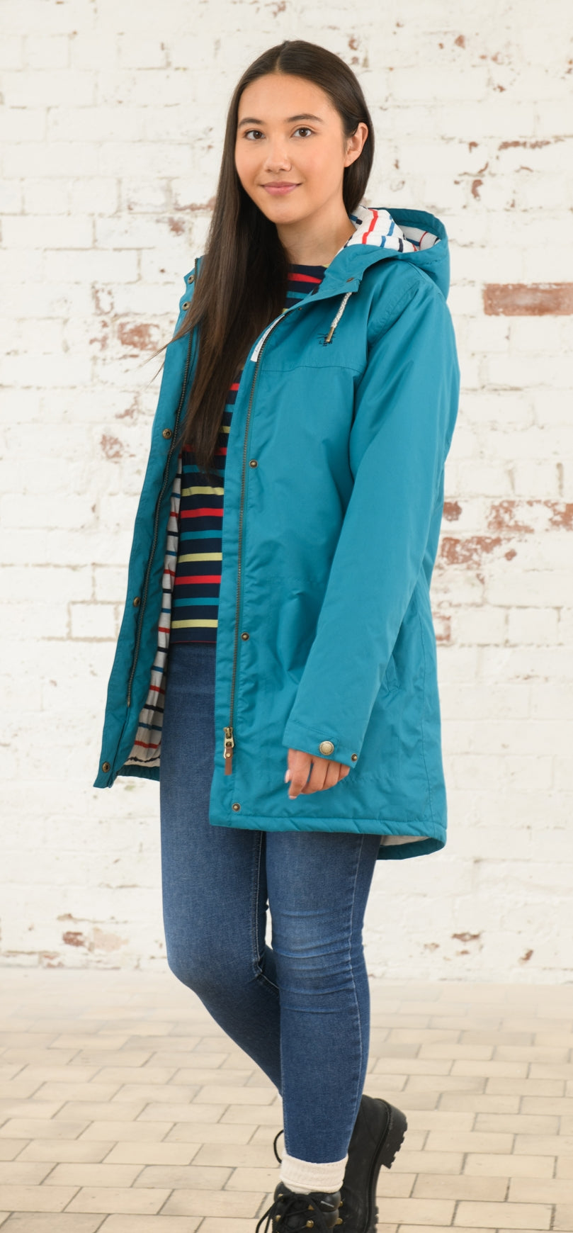 Women's Lighthouse Eva Long padded waterproof jacket in Peacock.