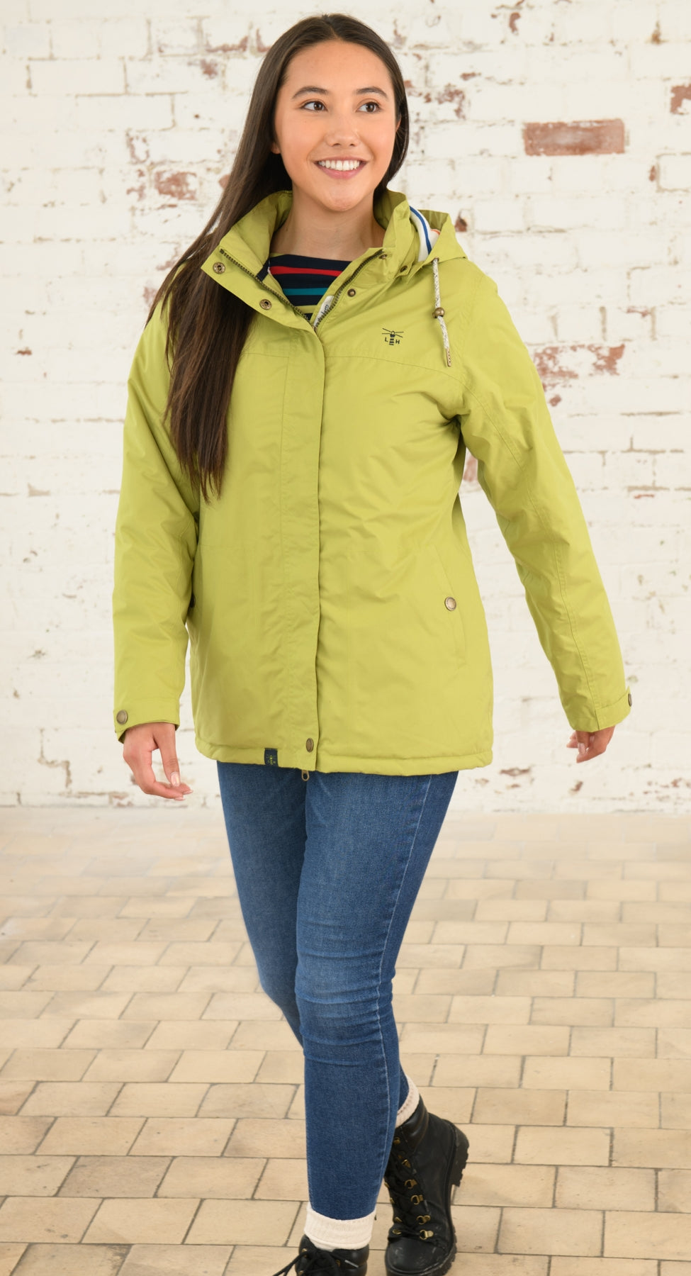 Apple Green women's waterproof Eva rain jacket from Lighthouse.