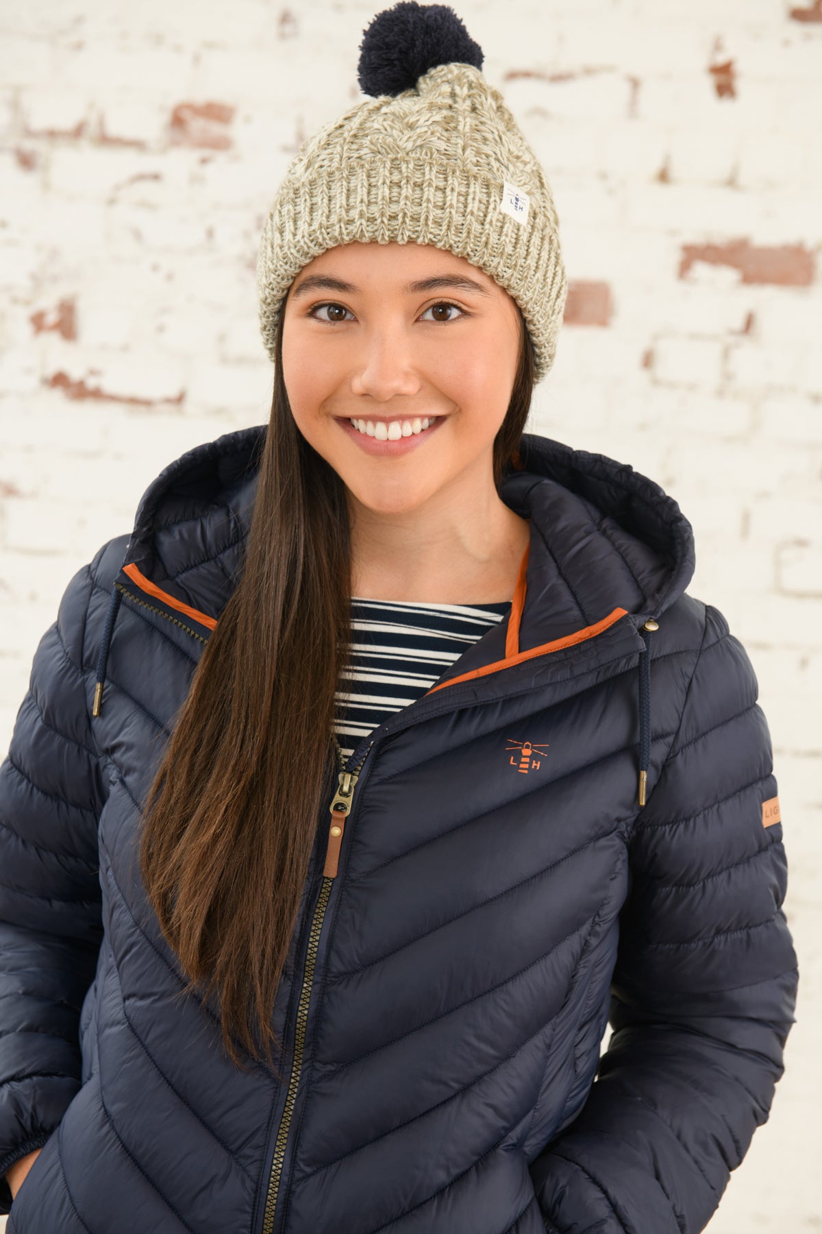 A navy women's padded Laurel hooded jacket from Lighthouse.