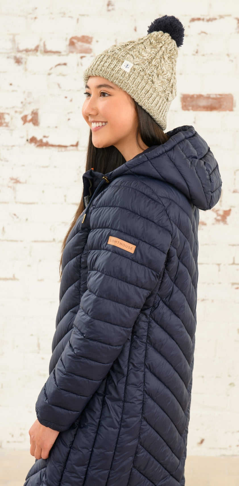 Women's Laurel padded puffer jacket in Navy from Lighthouse.