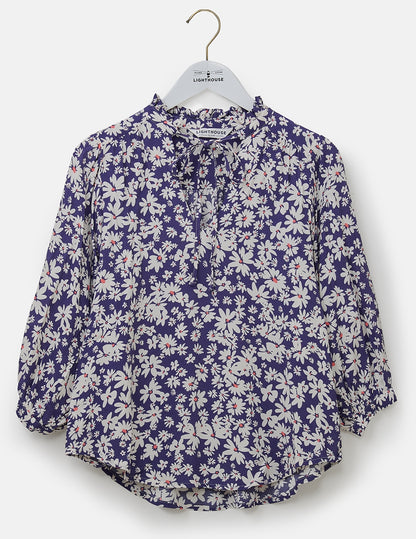 Indigo blue with white and yellow daisy pattern Lola women's blouse from Lighthouse.