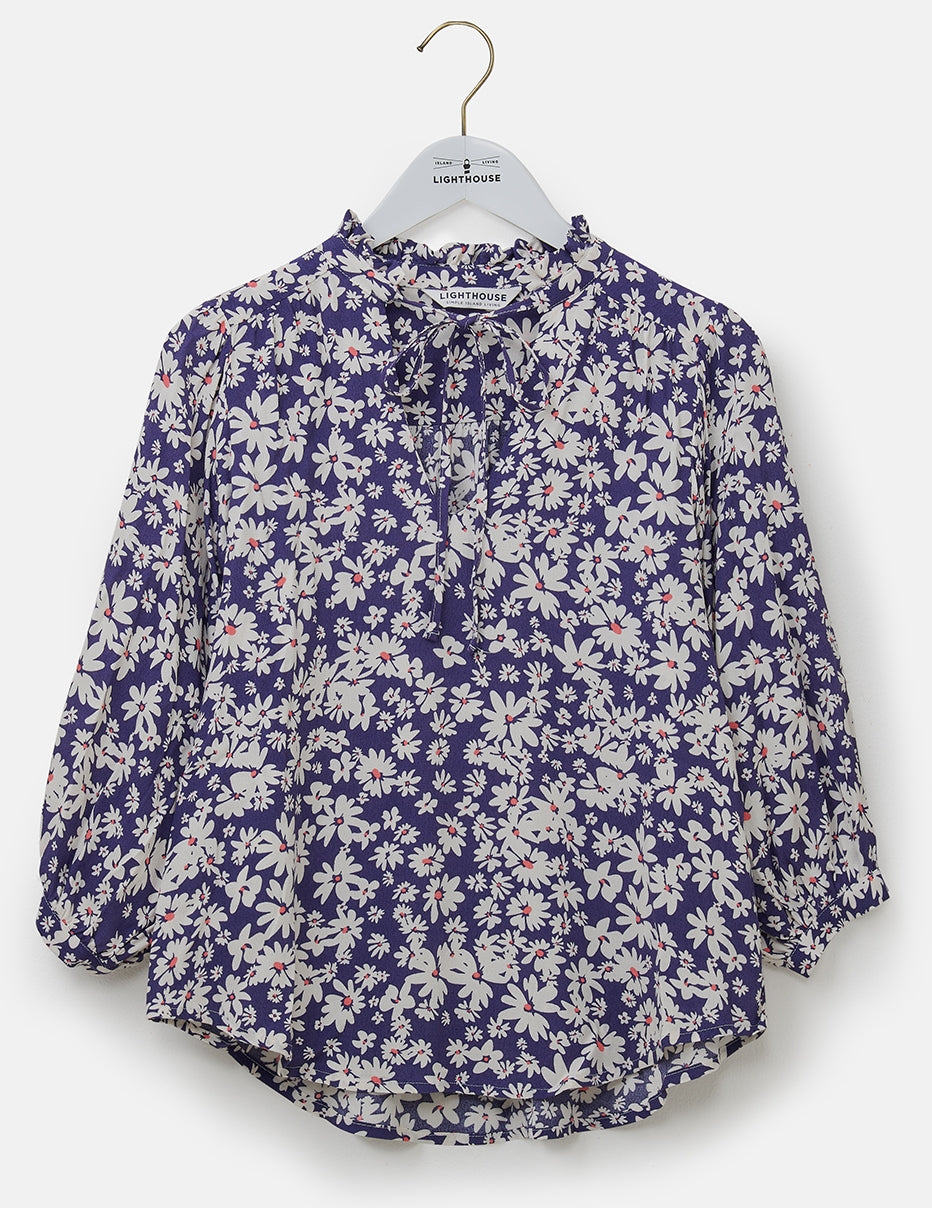 Indigo blue with white and yellow daisy pattern Lola women's blouse from Lighthouse.