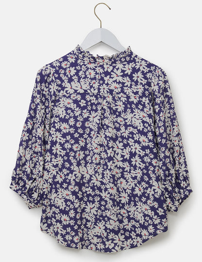 Three quarter sleeve women's Lola blouse from Lighthouse in indigo blue with a white daisy print.