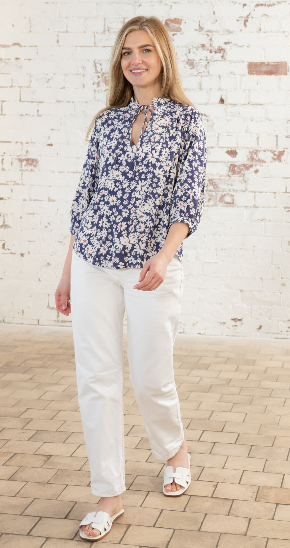 Lighthouse Lola women's blouse in indigo with a daisy floral print.