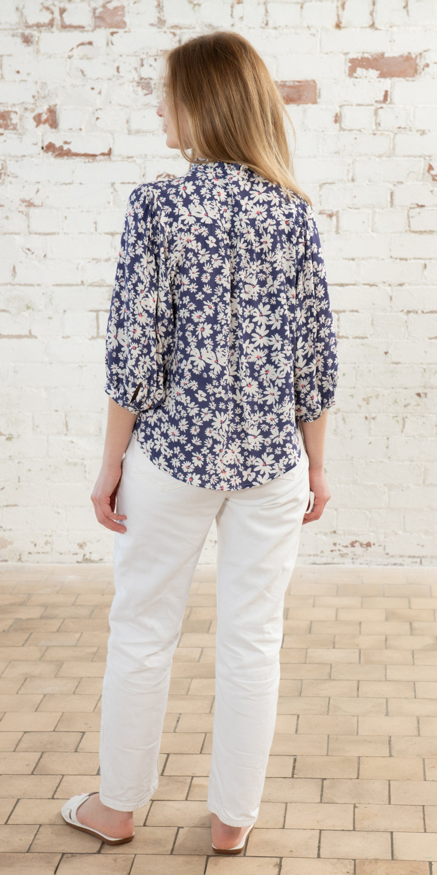 Lighthouse womens Lola blouse from Lighthouse in indigo blue with a white and yellow floral Daisy print.