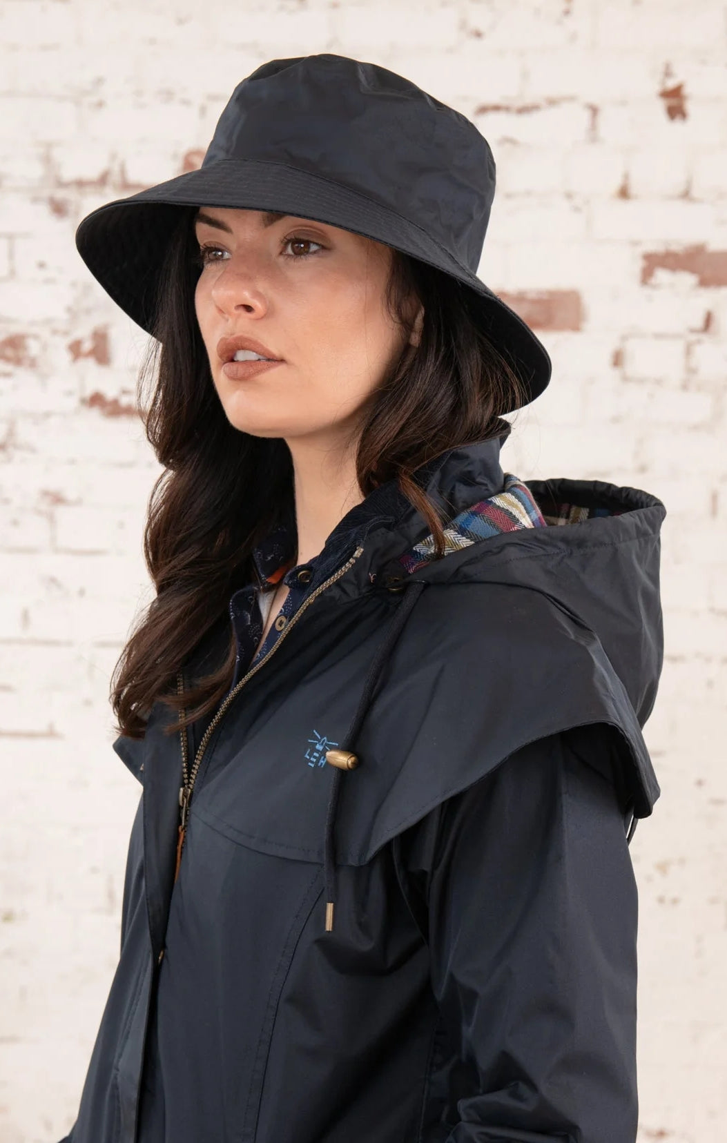 Adults waterproof wide brim Storm rain hat from Lighthouse in Nightshade Navy. 