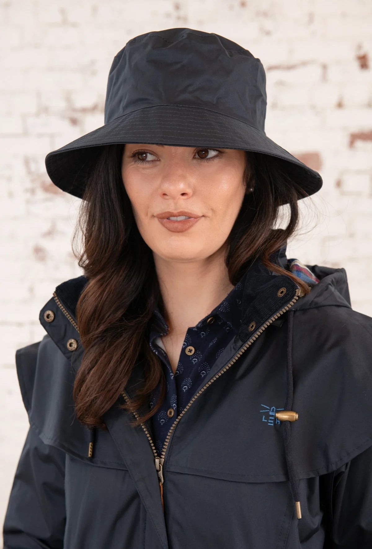 Adults waterproof wide brim Storm rain hat in Nightshade Navy from Lighthouse.