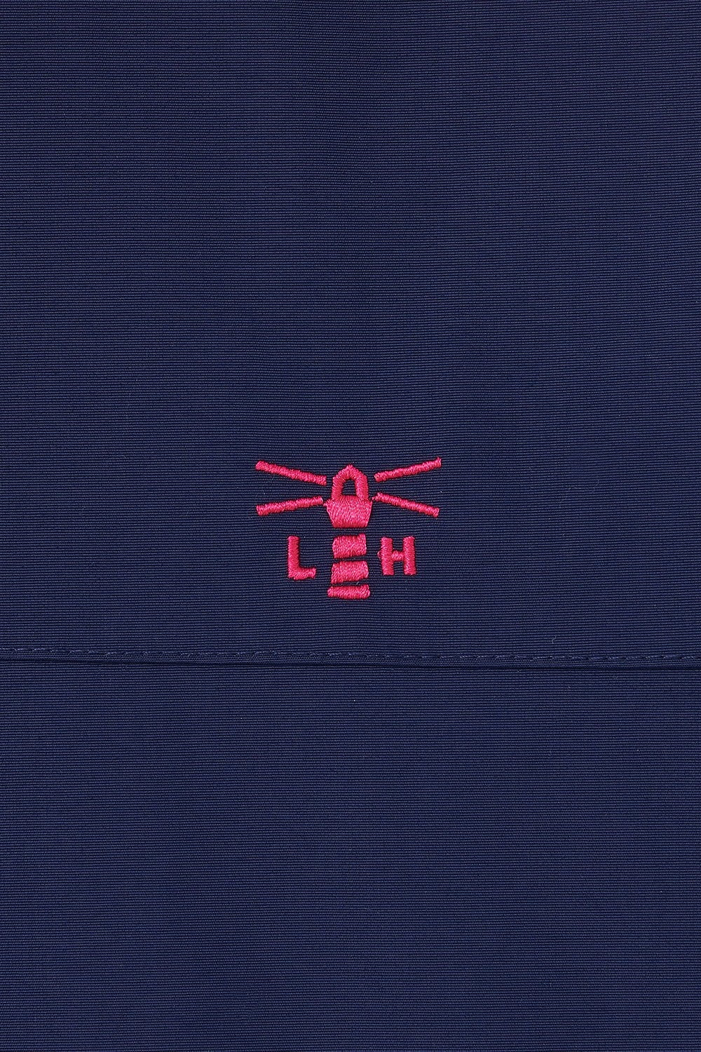 Lighthouse women's Navy waterproof Rebecca jacket with embroidered logo.