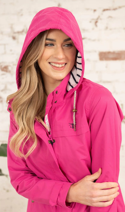 Lighthouse women's hooded Beachcomber waterproof jacket in Pink.