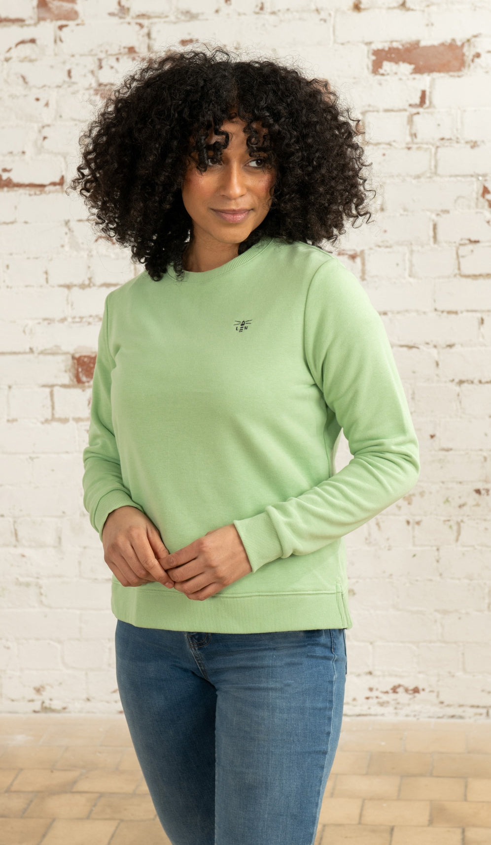 Plain Soft Green crew neck women's sweatshirt from Lighthouse.