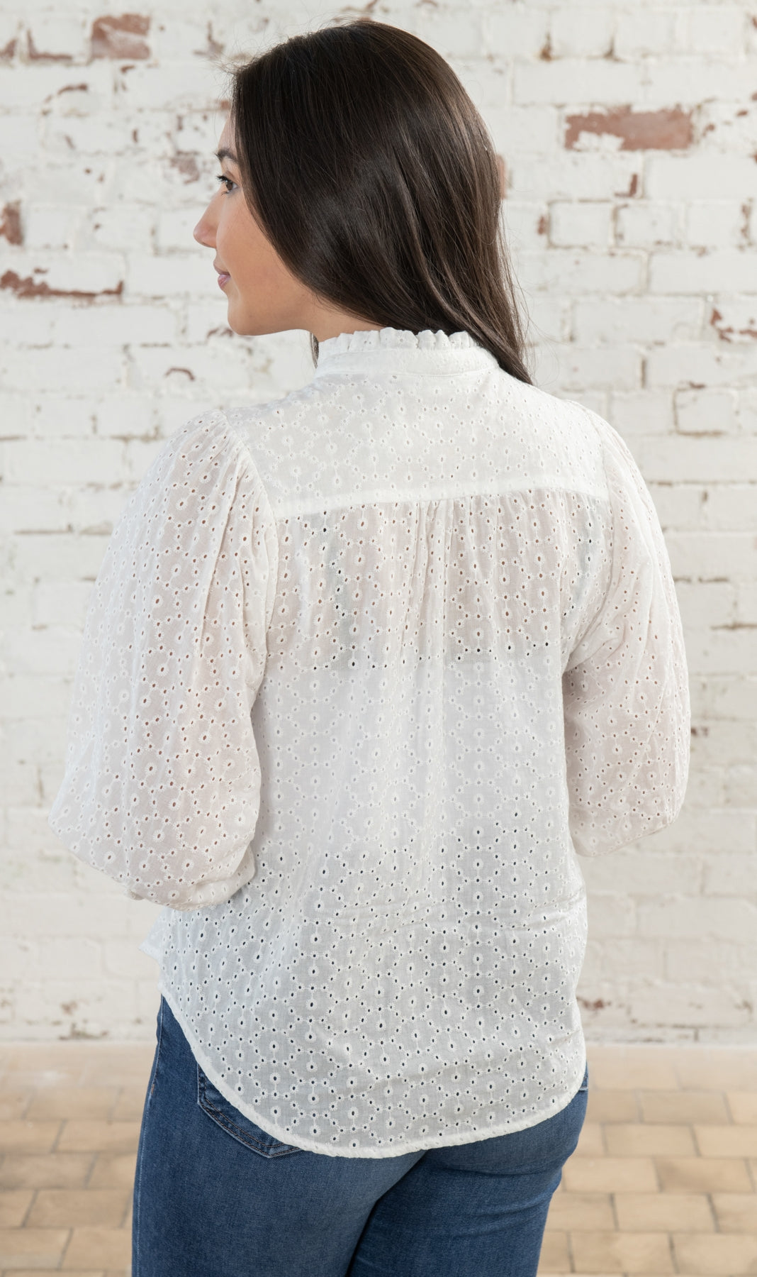 Lighthouse women's Lola blouse in a sheer white Broderie Anglaise fabric.