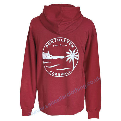 A unisex red popover hoodie shown from the back, featuring a large white circular graphic with the text 'PORTHLEVEN' 'Salt Cellar' and 'CORNWALL' with the Porthleven harbour and clocktower, waves and a palm tree illustration.