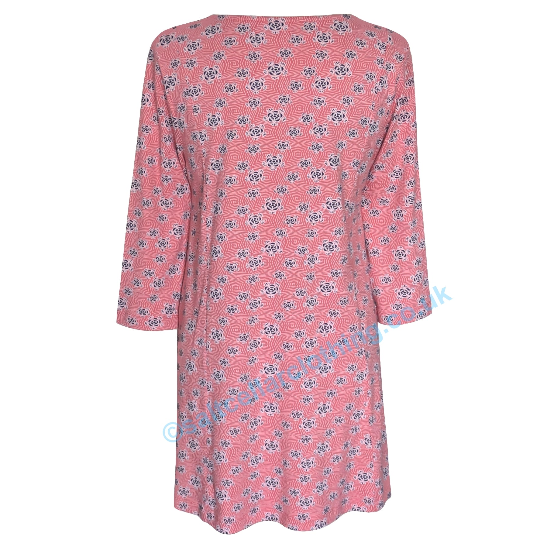 Back view of a Mudd and Water womens Francoise tunic in coral with a geo floral pattern and 3/4 length sleeves on a white background