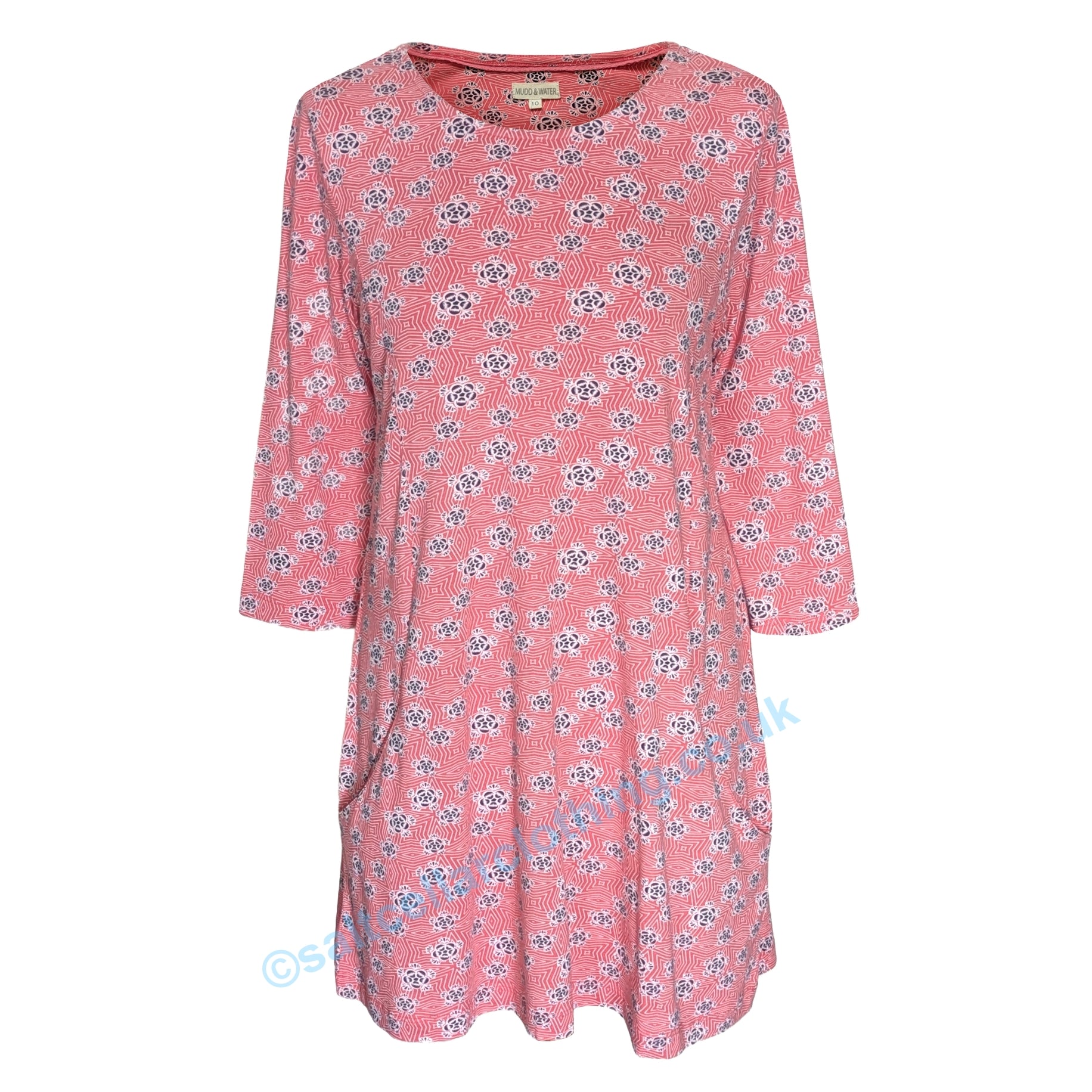 Front view of a womens Mudd & Water Francoise tunic in coral with a geometric floral print and 3/4 length sleeves on a white background