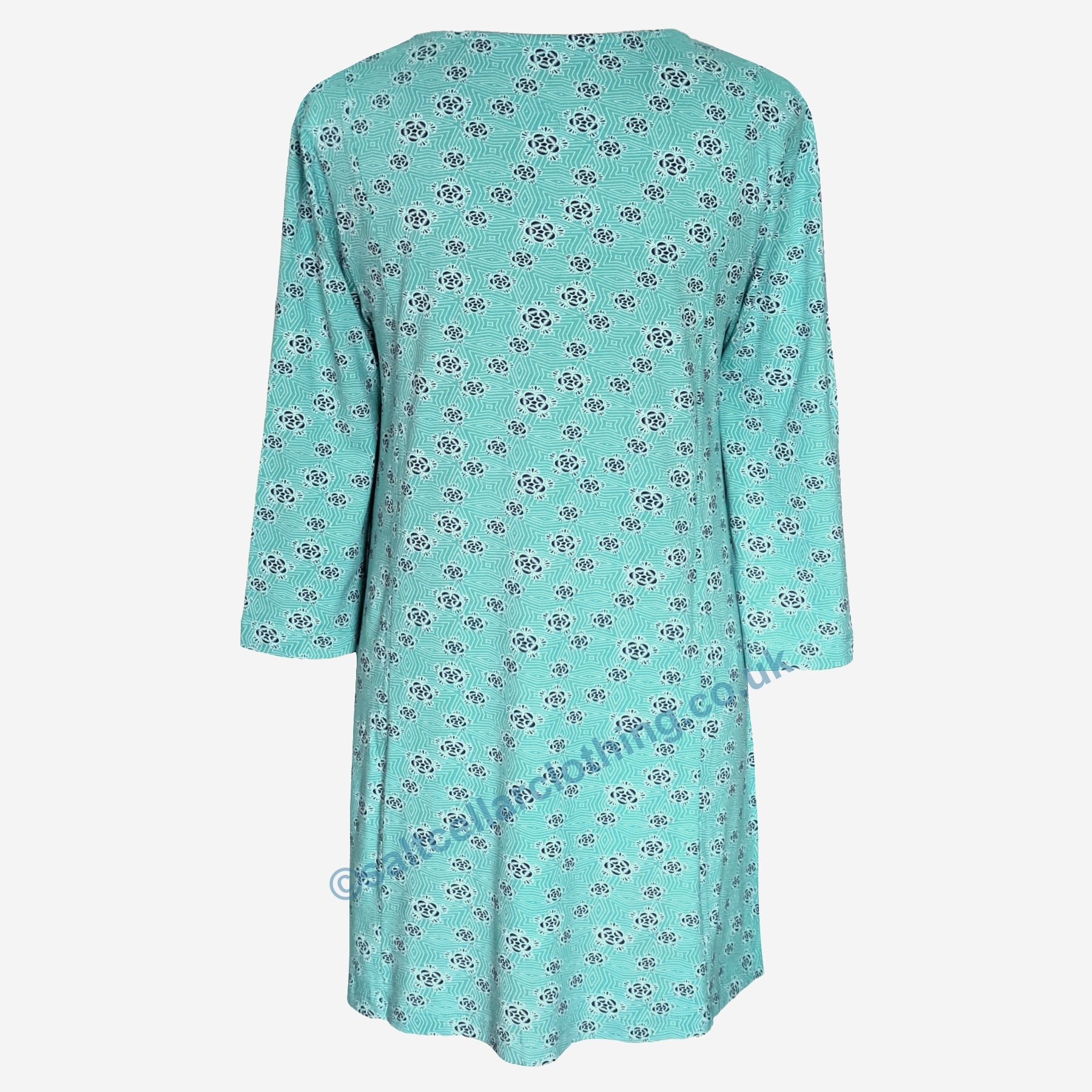 Back view of a womens Mudd & Water Francoise tunic in turquoise with a geo pattern and three quarter length sleeves on a white background