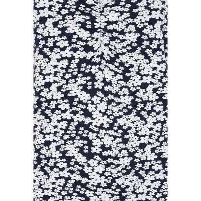 Close-up of fabric pattern on Mudd and Water womens Florina floral Navy dress with white flowers