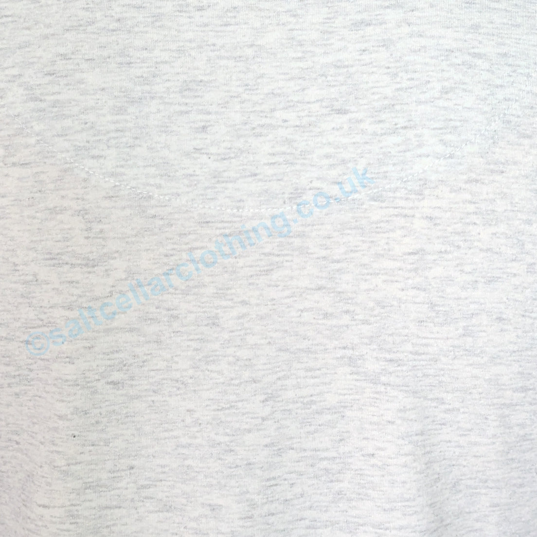 Close-up of the white marl fabric of a Mudd & Water Meander Vest