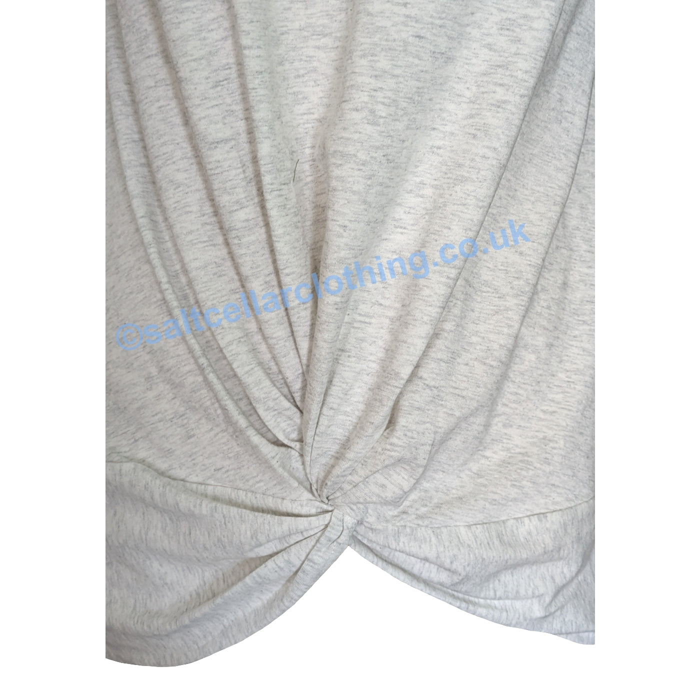 Close up of the twisted fabric front design of a Mudd & Water womens Petal tee in White Marl.