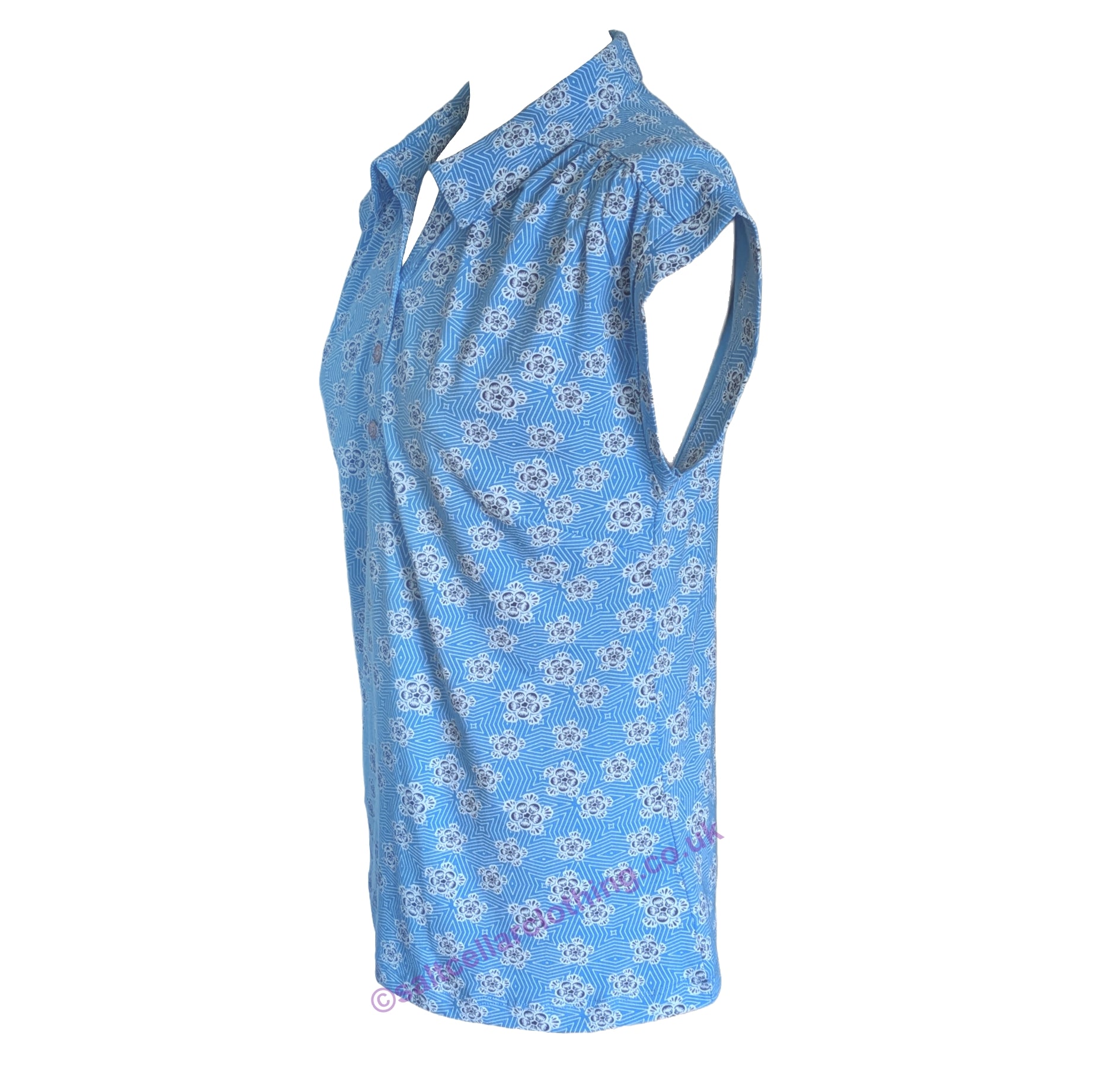 Side view of the womens Mudd & Water Alice top in Blithe Blue geo print with cap sleeves and collared neckline on a white background