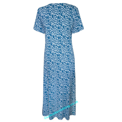 Back view of a Mudd & Water womens short sleeve Iris Dress in Teal blue with a white floral print, on a white background