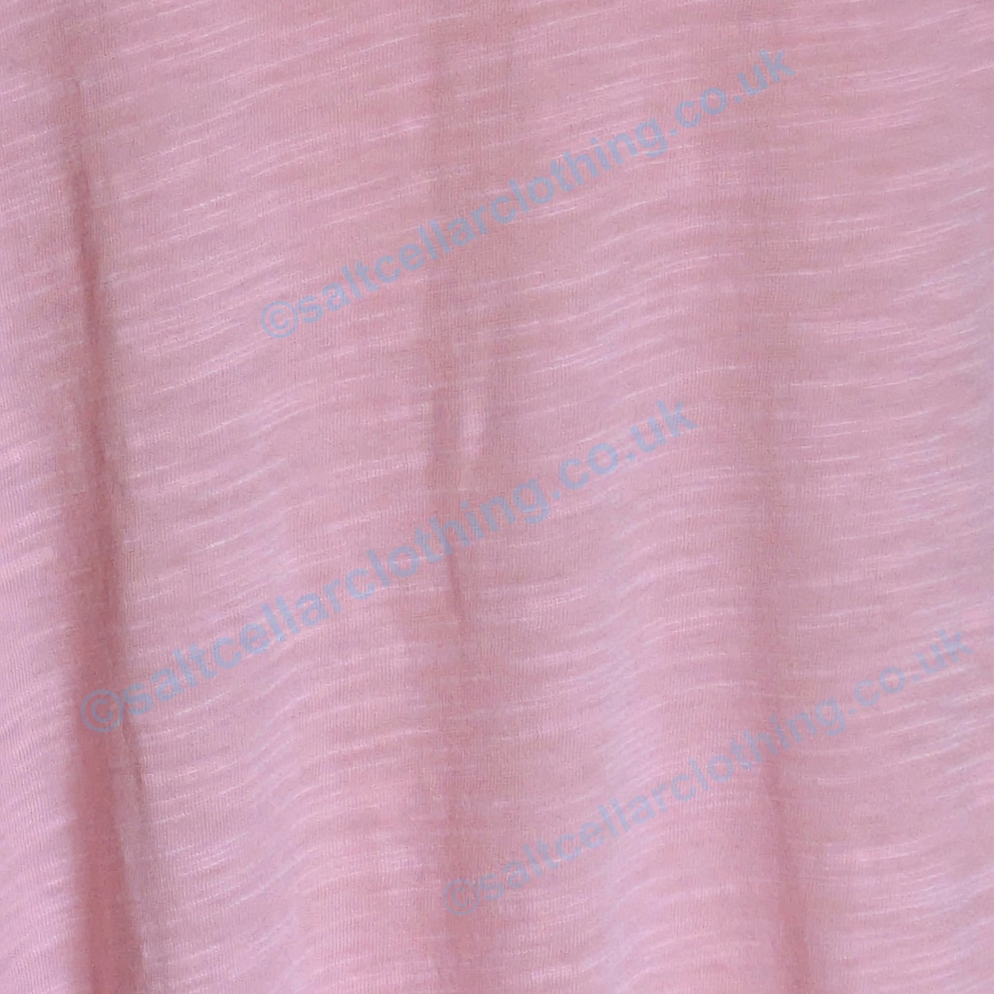 Close-up of the Candy Pink slub fabric of a Mudd & Water womens Rozela vest.