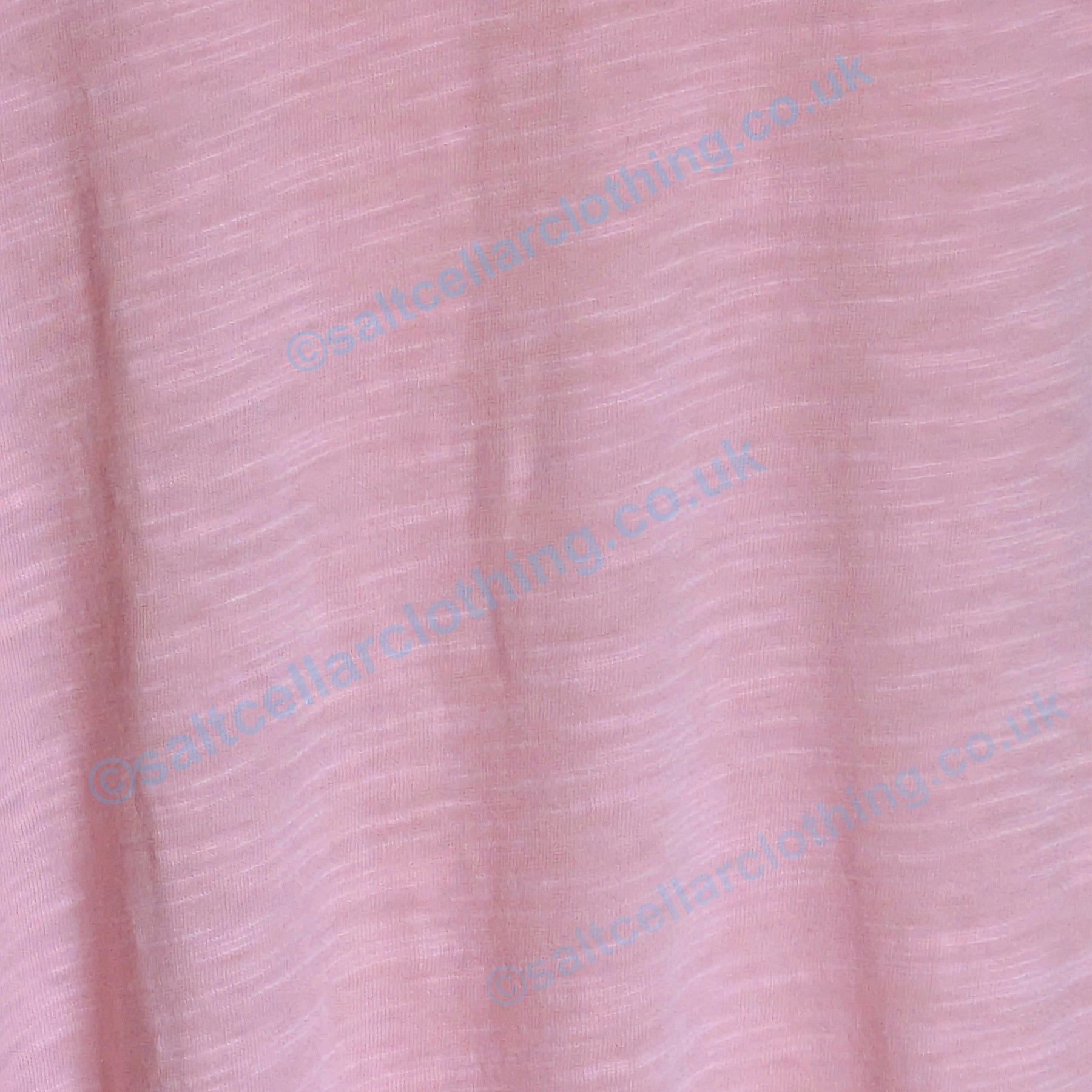 Close-up of the Candy Pink slub fabric of a Mudd & Water womens Rozela vest.