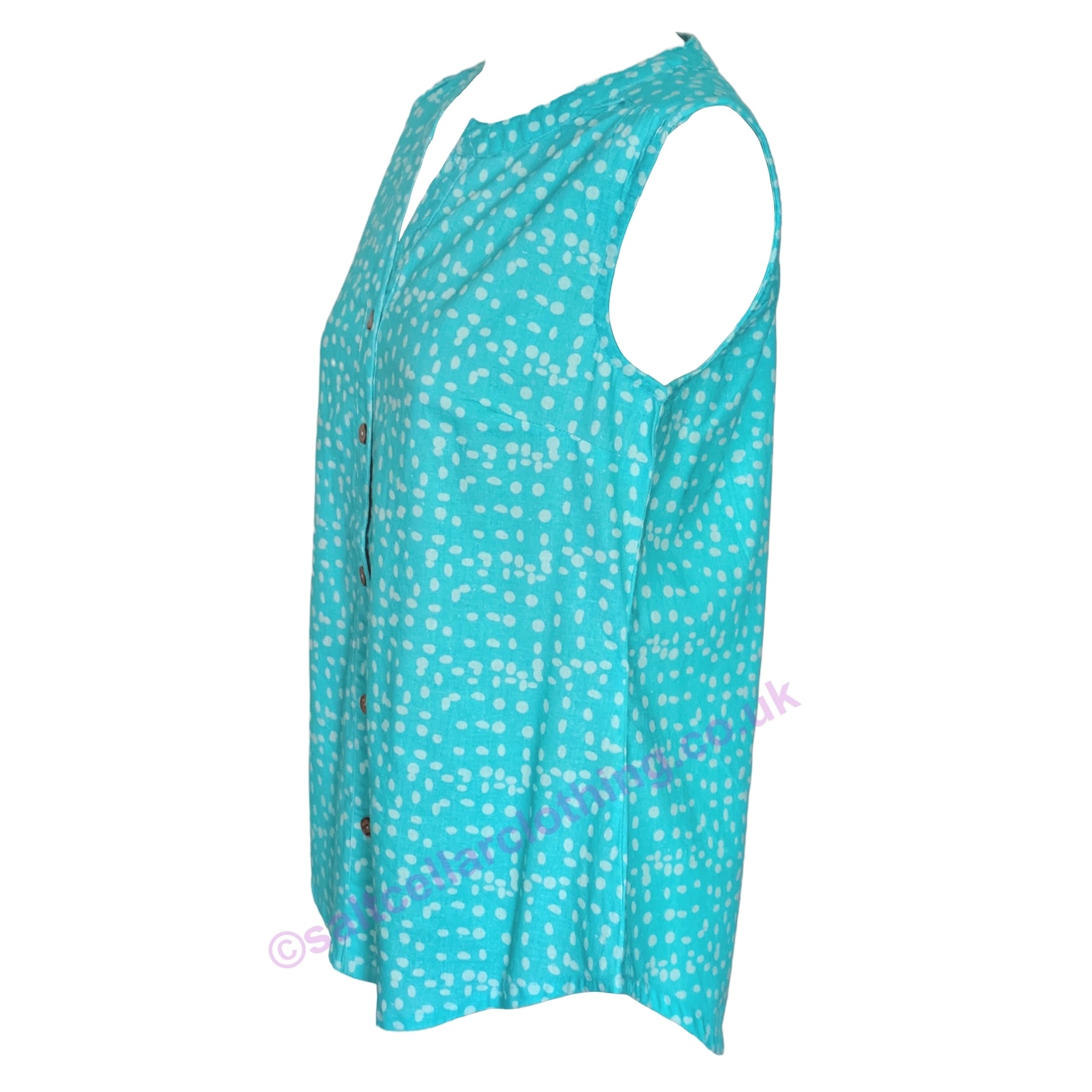 Side view of a womens Mudd & Water Sunrise Blouse vest with button front in turquoise with a dot print on a white background