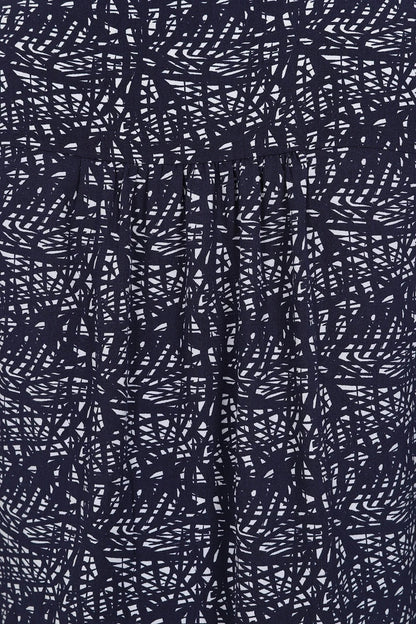 Close-up of Mudd and Water womens tunic navy with abstract white and navy pattern fabric