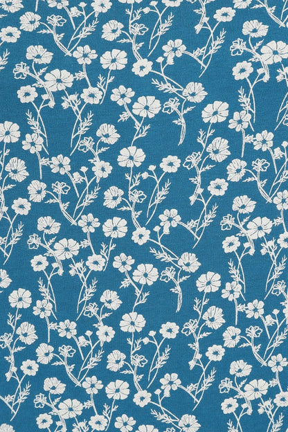 Mudd & Water women's Fern top in Teal Blue with white floral Meadow pattern.