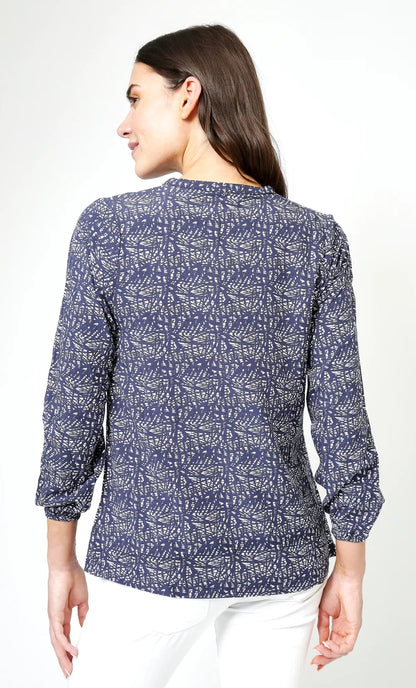 Women's 3/4 sleeve, mandarin collar Bailey blouse from Mudd & Water in navy with a white abstract pattern.