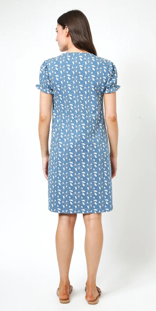 Women's short sleeve dress from Mudd & Water in Teal Blue with a white polka dot and leaf print with a v-neckline and gathered sleeve cuffs.