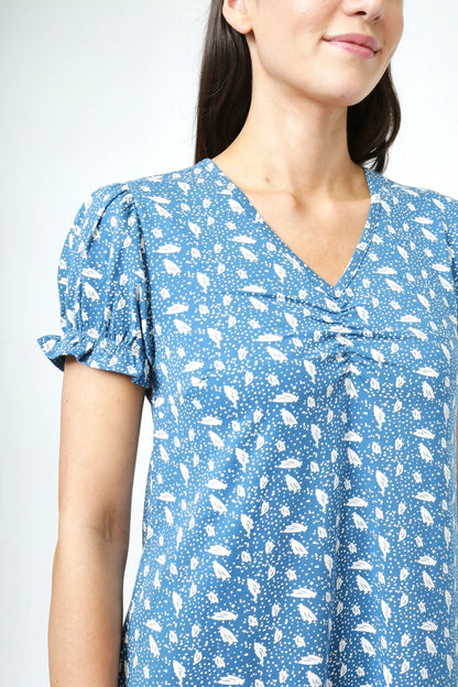 Mudd & Water women's Florina Dress in Teal Blue with a white polka dot and leaf print, V-neckline and gathered sleeve cuffs.