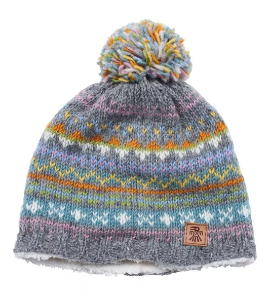A Pachamama knitted beanie bobble hat in a grey and multicolour Fair Isle pattern on a white background