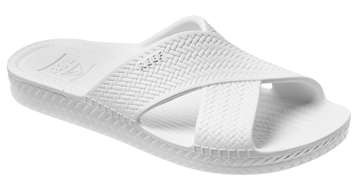 Front view of Reef womens Slide Sandals White with cushioned sole and textured crossover straps