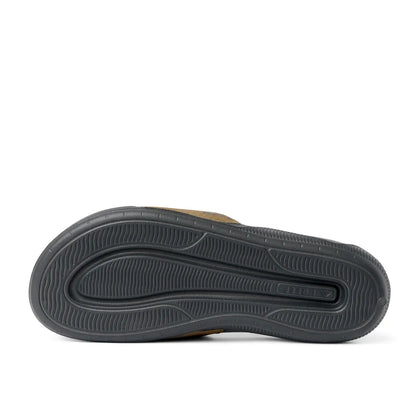 Bottom sole view of a mens Reef Tailslide slider sandal in grey with a tan brown padded strap.
