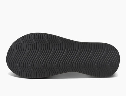 Sole of Reef mens cushion flip flops featuring a durable, textured tread for enhanced grip