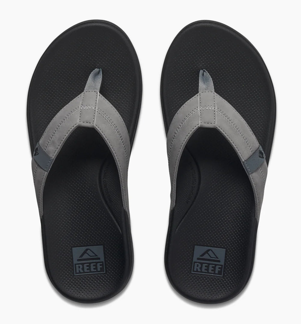 Reef mens cushion flip flops in gray with comfortable footbed for casual summer wear