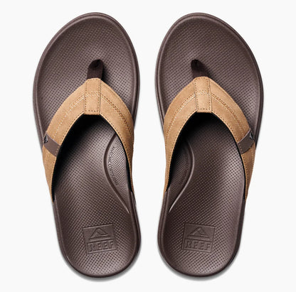 Reef mens cushion flip flops in brown with soft straps and comfortable footbed for everyday wear