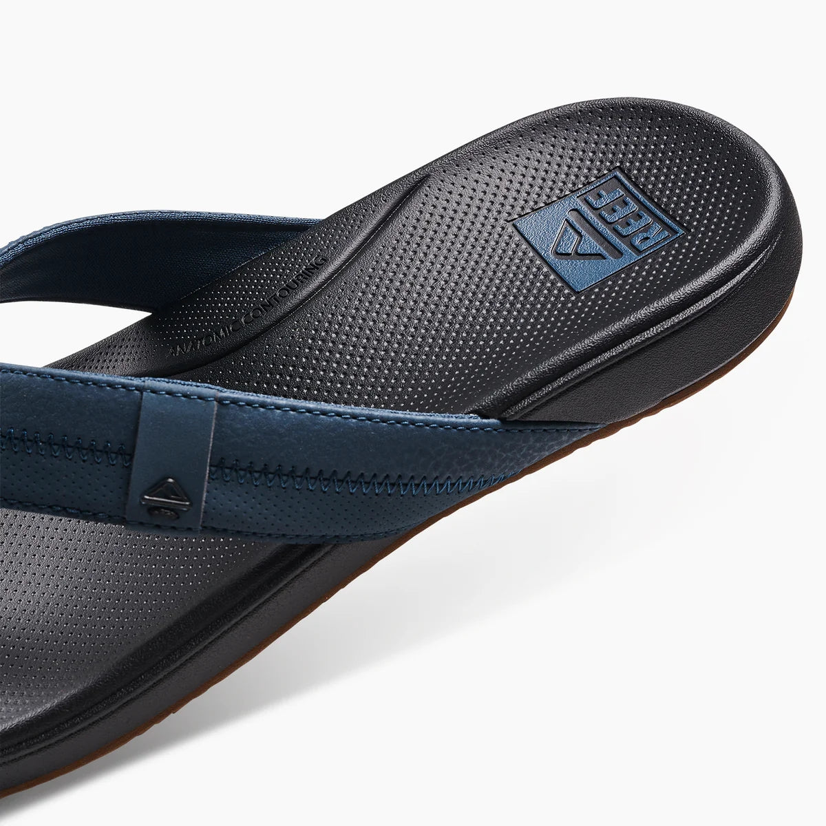 Reef Mens Cushion Phantom Flip Flops with durable straps and cushioned footbed for comfort
